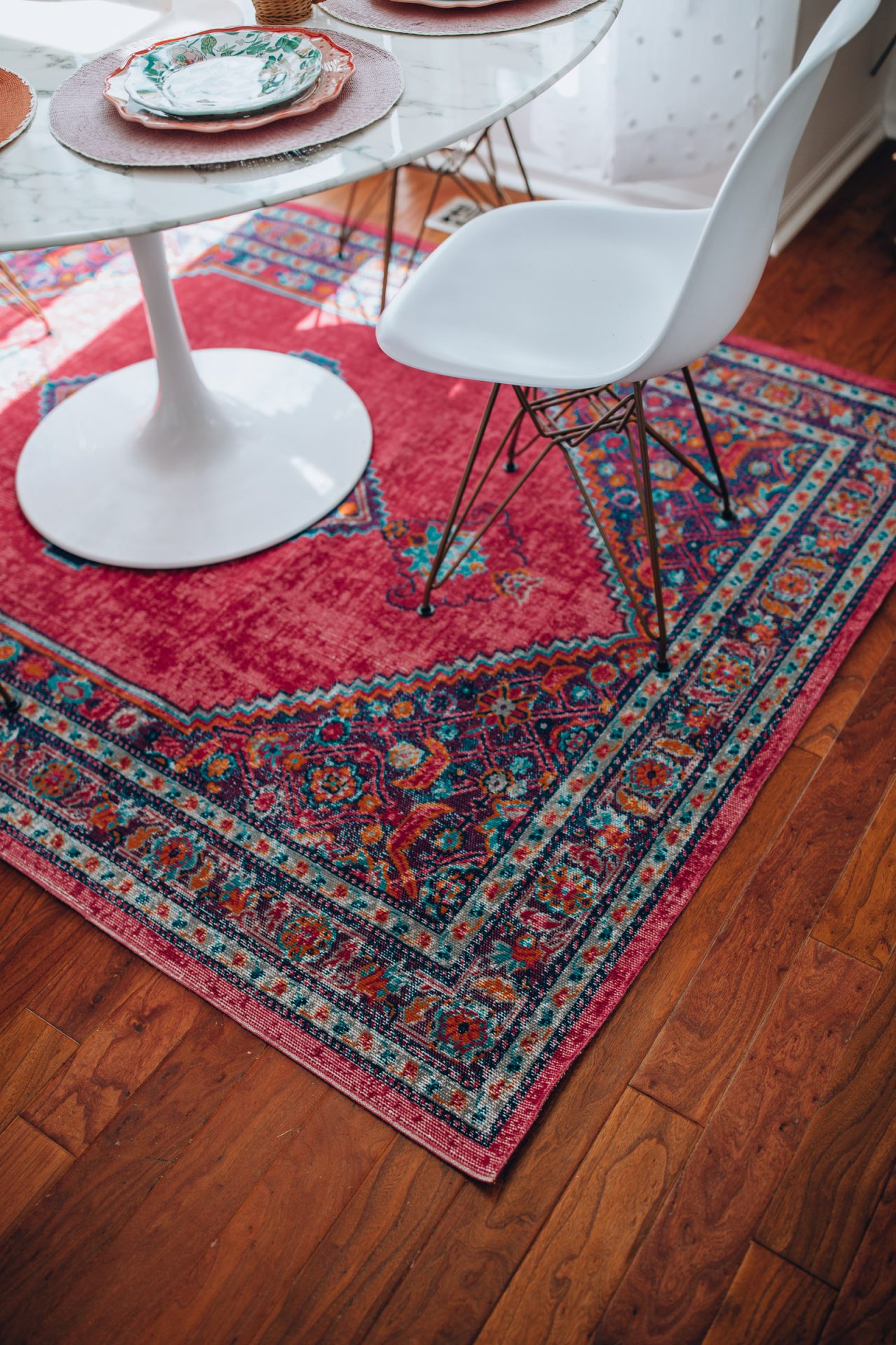 Chicago lifestyle blogger, Happily Inspired shares how to transform your entire kitchen with this simple trick! Plus, a list of the best walmart kitchen rugs!