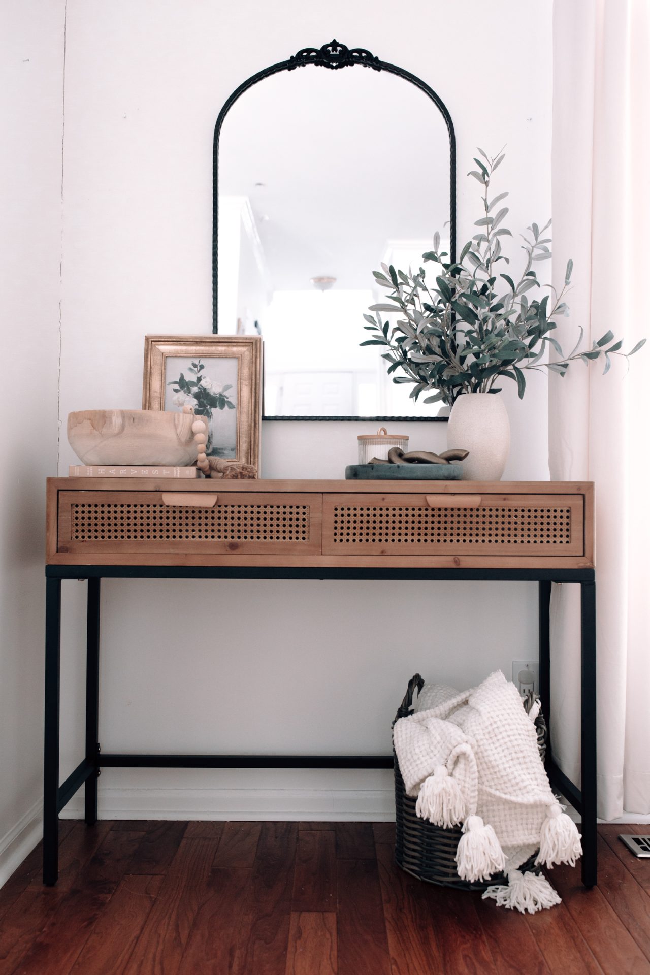 simple console table with decor and mirror 