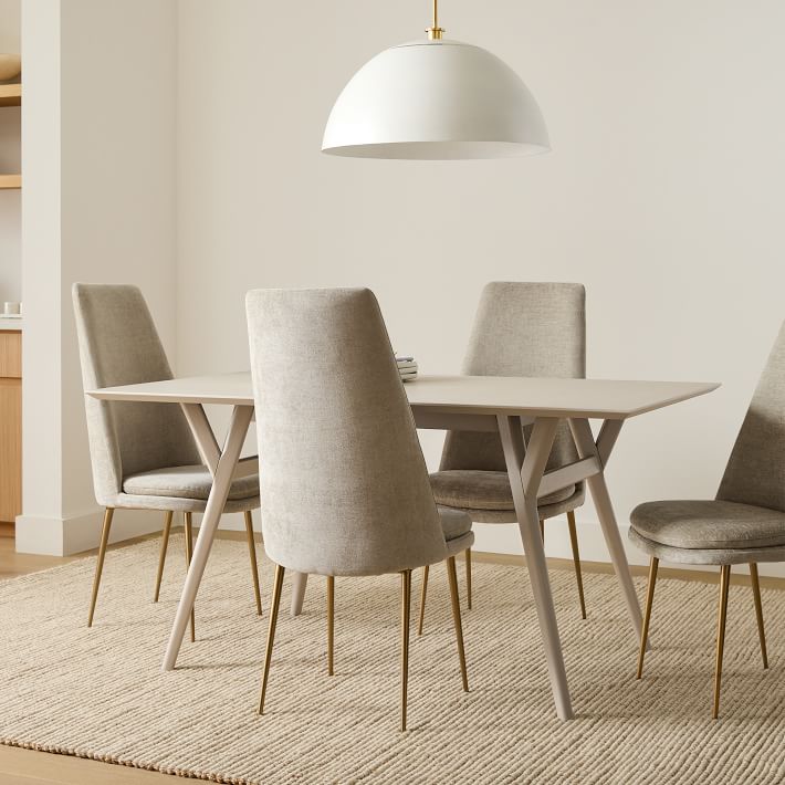 a mid-century modern dining table that works well in modern spaces. 