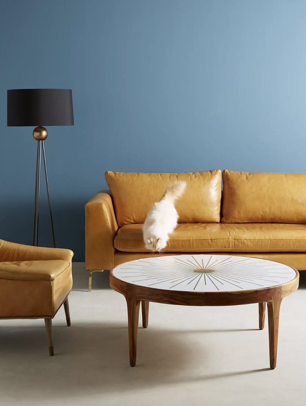 wood and white coffee table from anthropologie. 