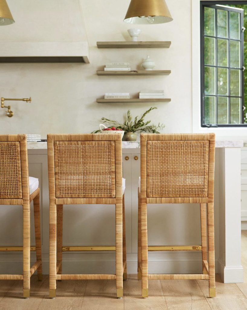 3 rattan bar stools at kitchen island.