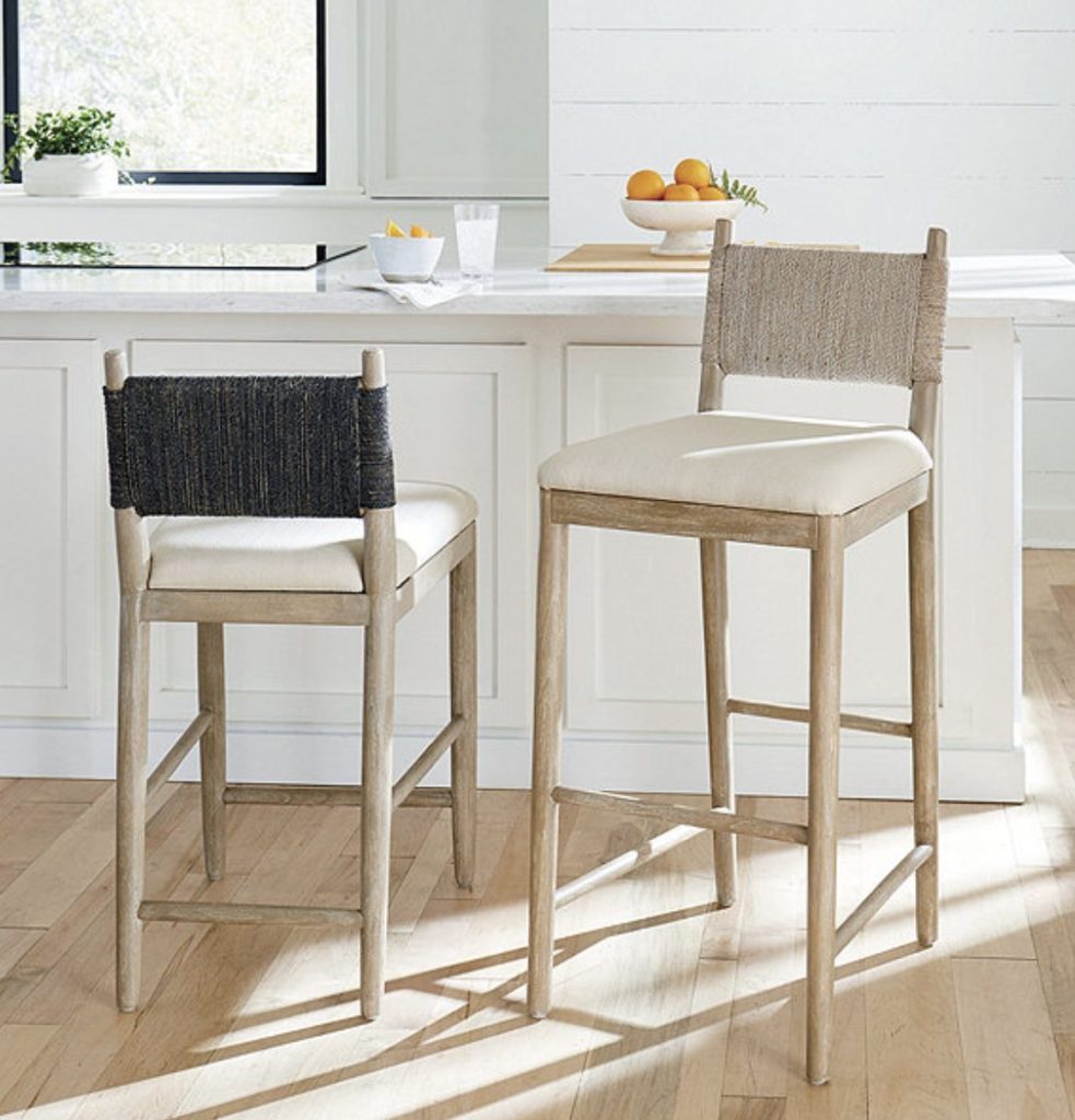 woven bar stools at kitchen island.