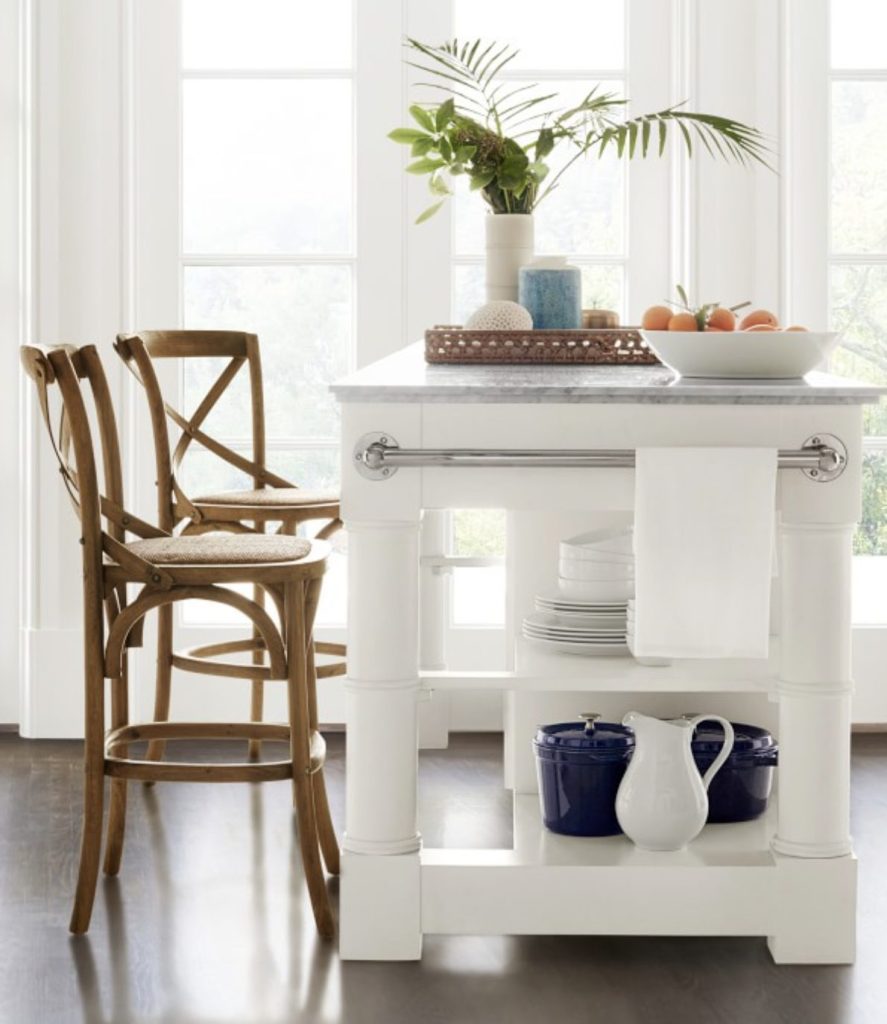 2 rattan bar stools at a kitchen island.