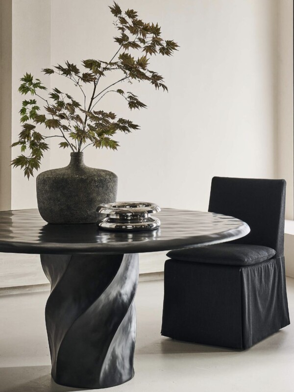modern round black dining table