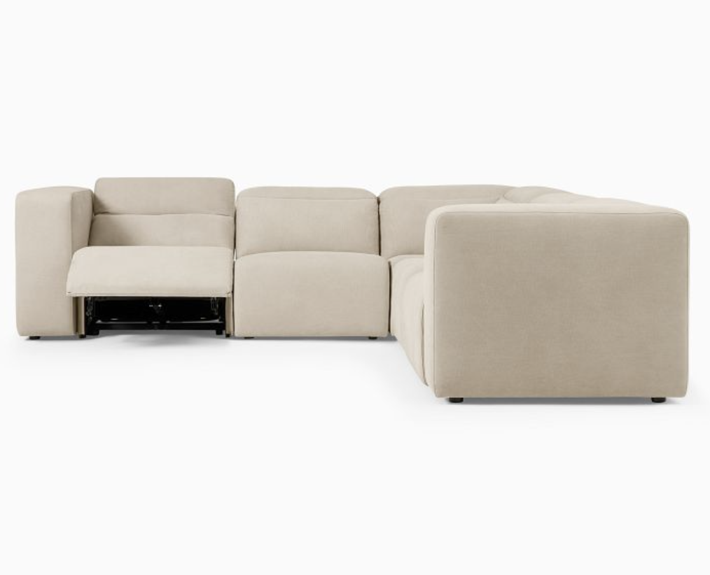 5 seat reclining sectional in cream.