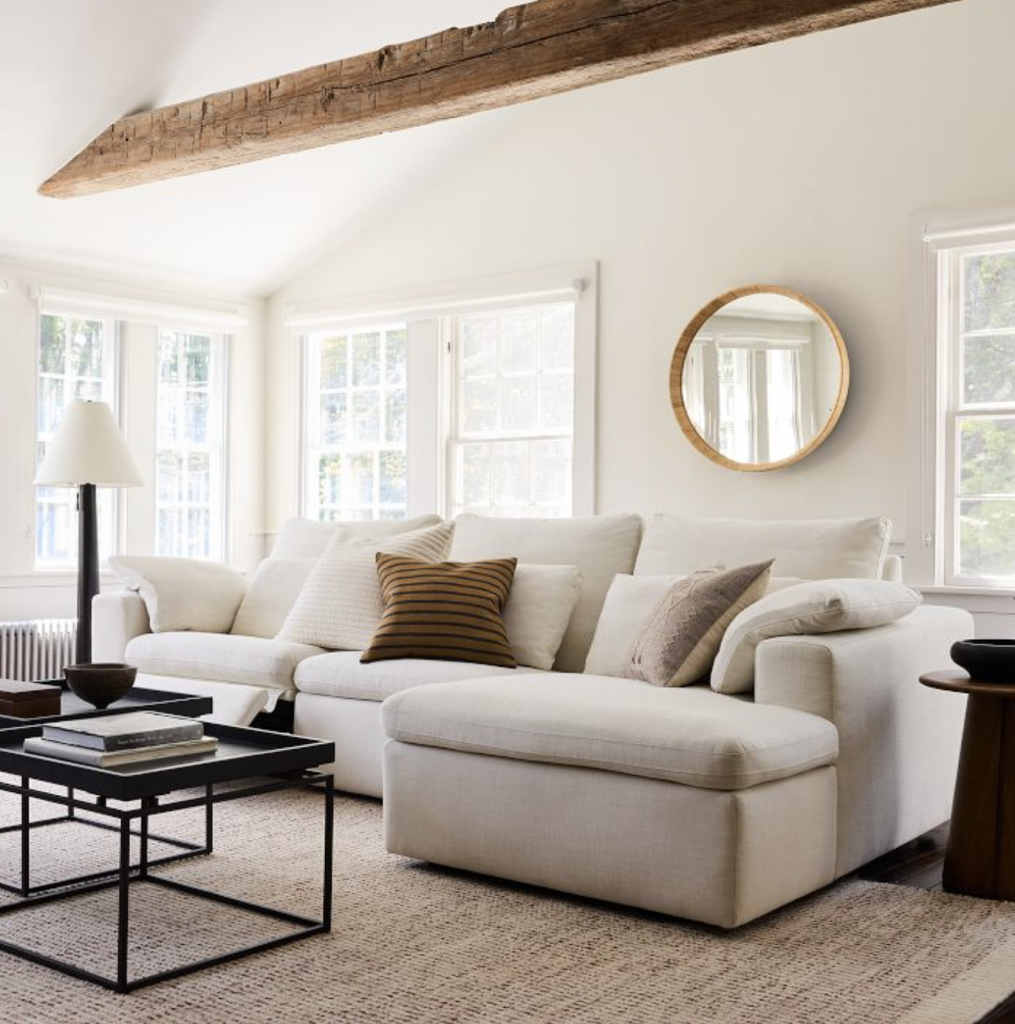 a living room reclining sofa in beige.