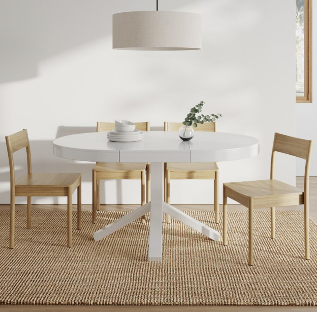 white round extendable dining table