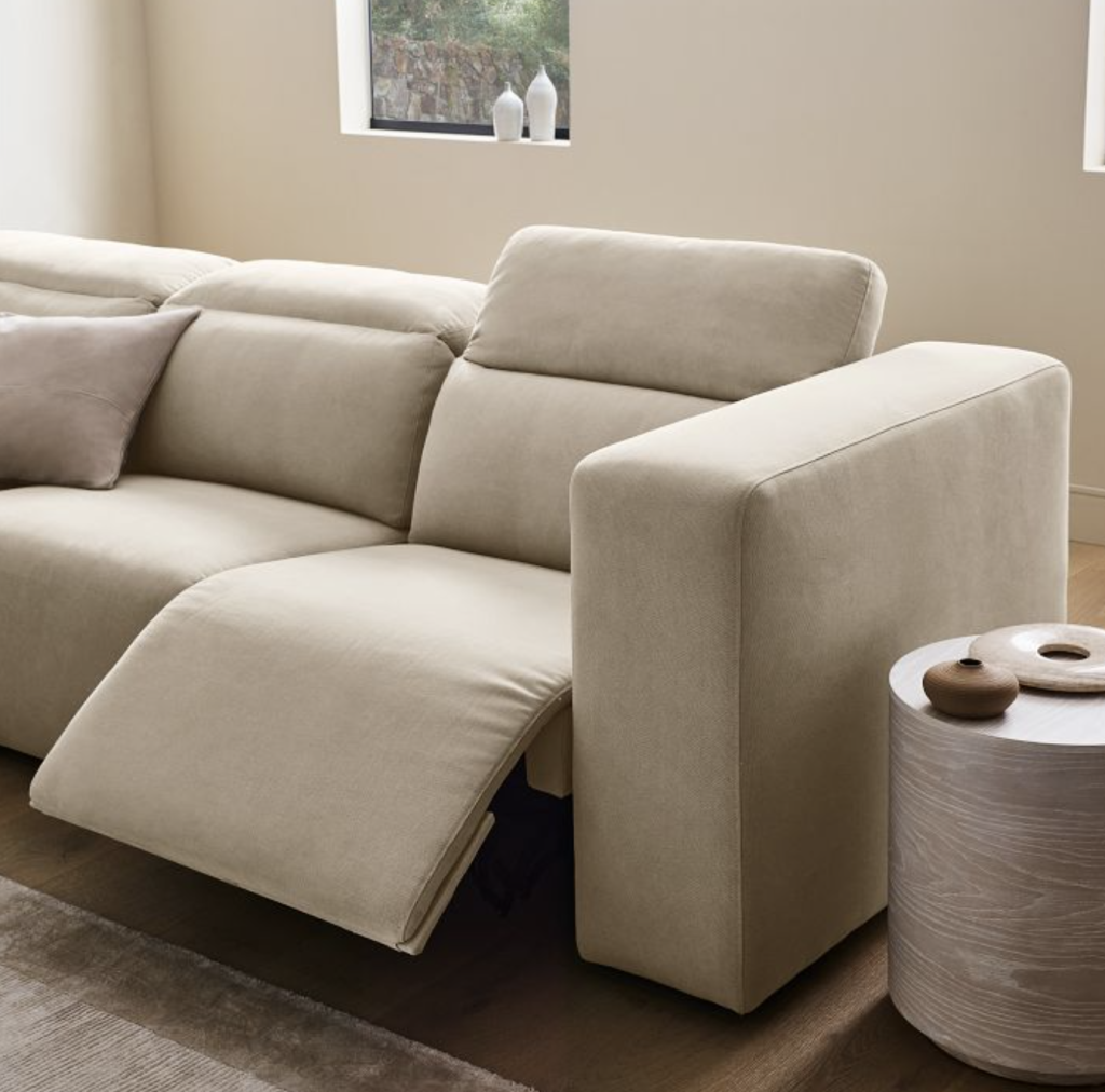 l shaped power reclining sectional in grey.