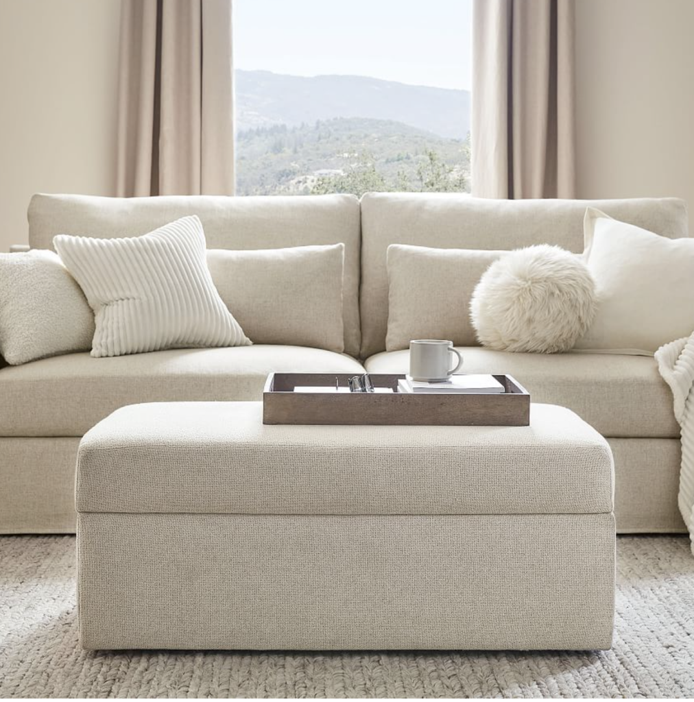 white hidden storage ottoman in living room. 