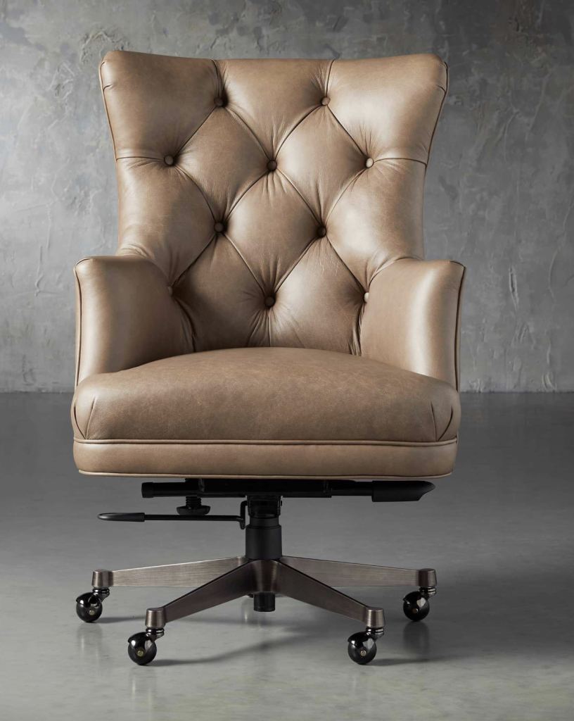 brown leather desk chair with buttons.