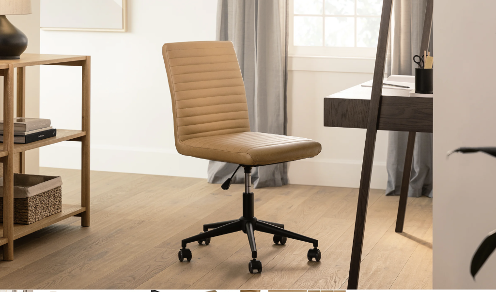 armless leather desk chair with swivel rolling legs. 